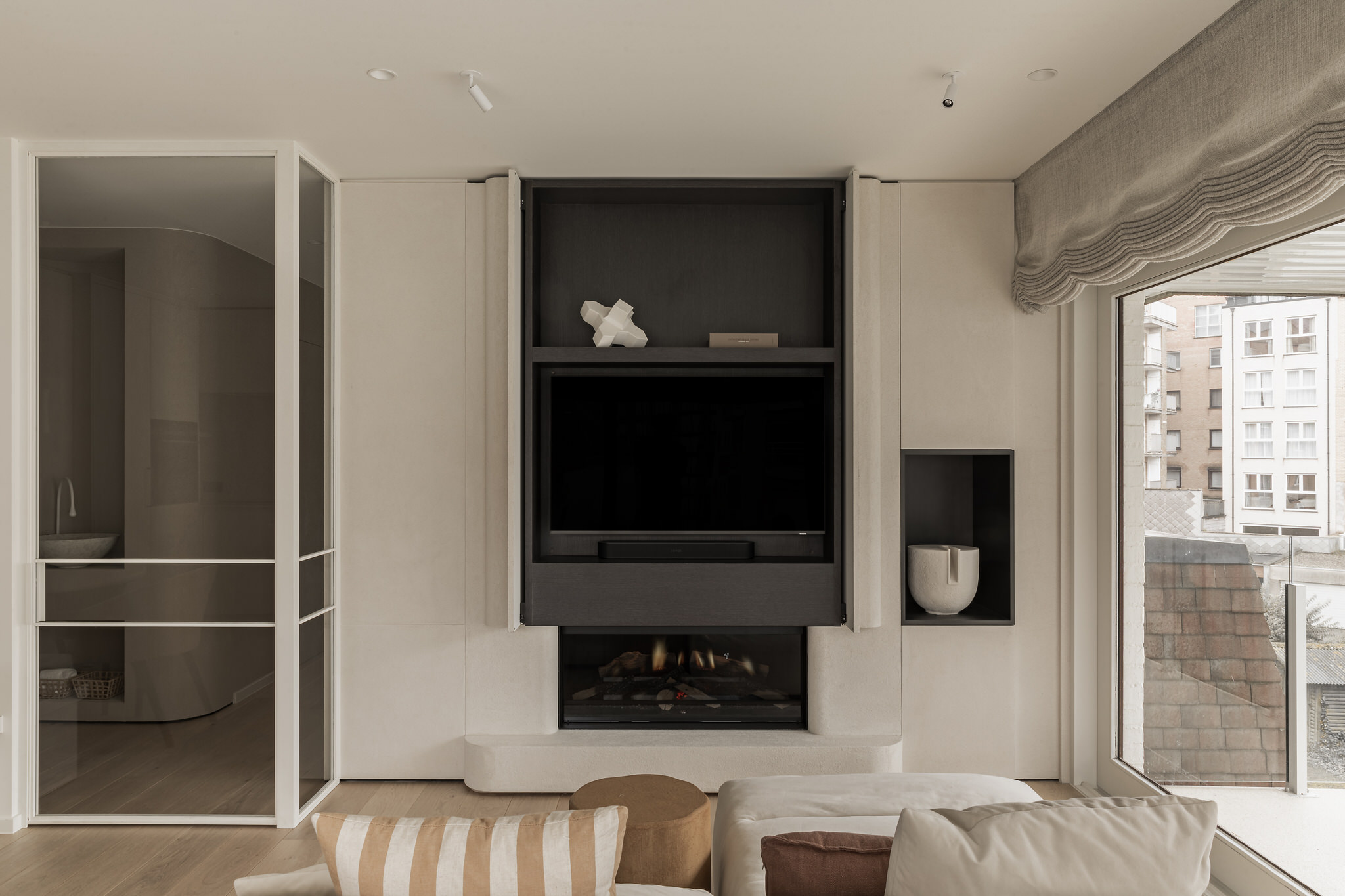 White Bolder vessel above TV unit, Studio 05 Knokke