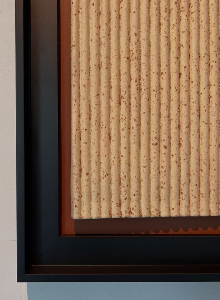 WAVE-R WALL piece framed on a hallway wall